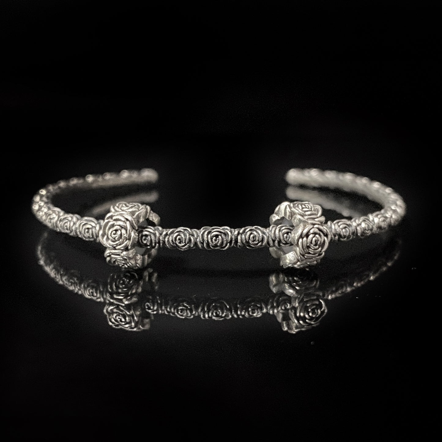 Meticulously crafted rose bangle bracelet.